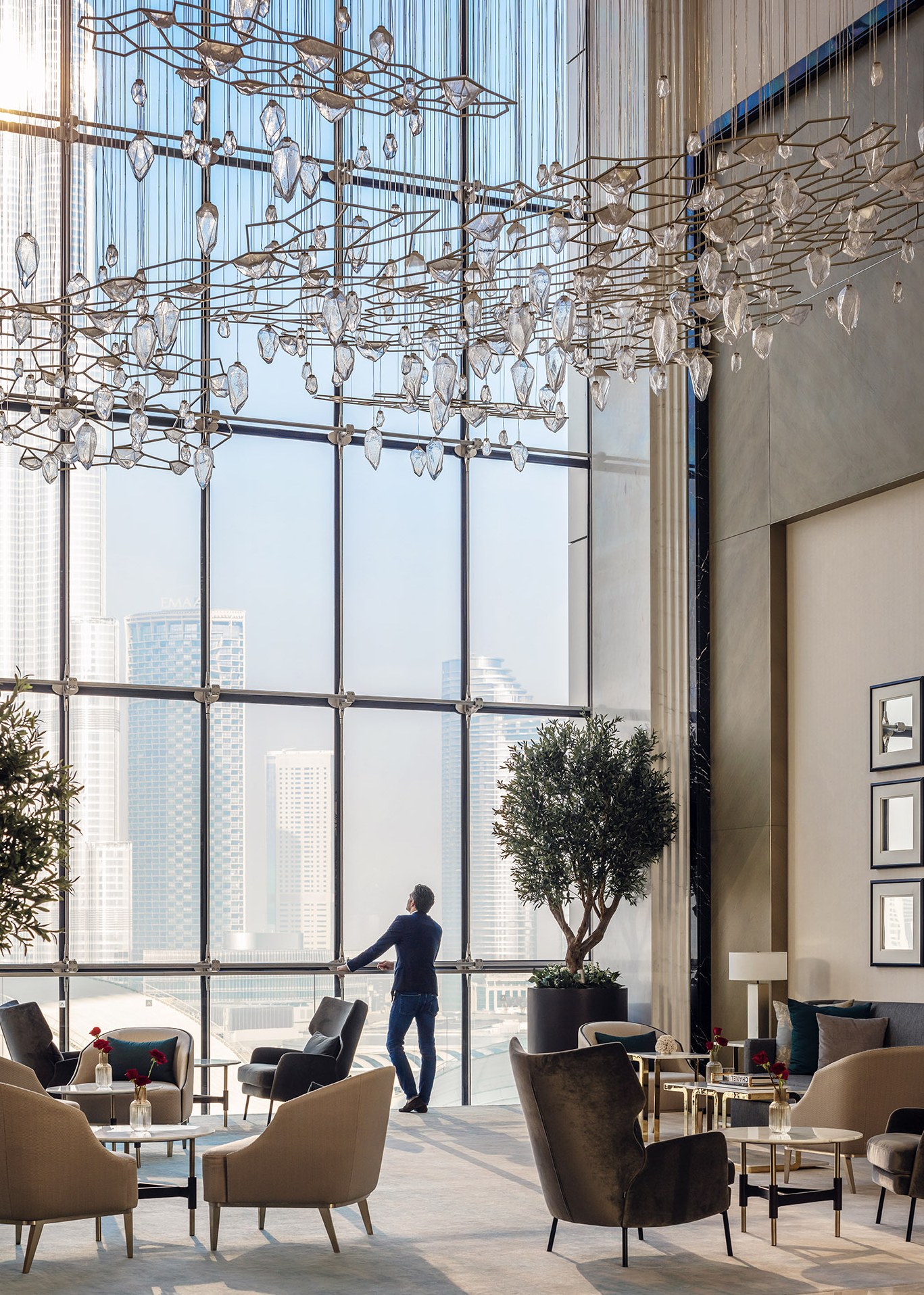 A guest in the fountain-view lobby