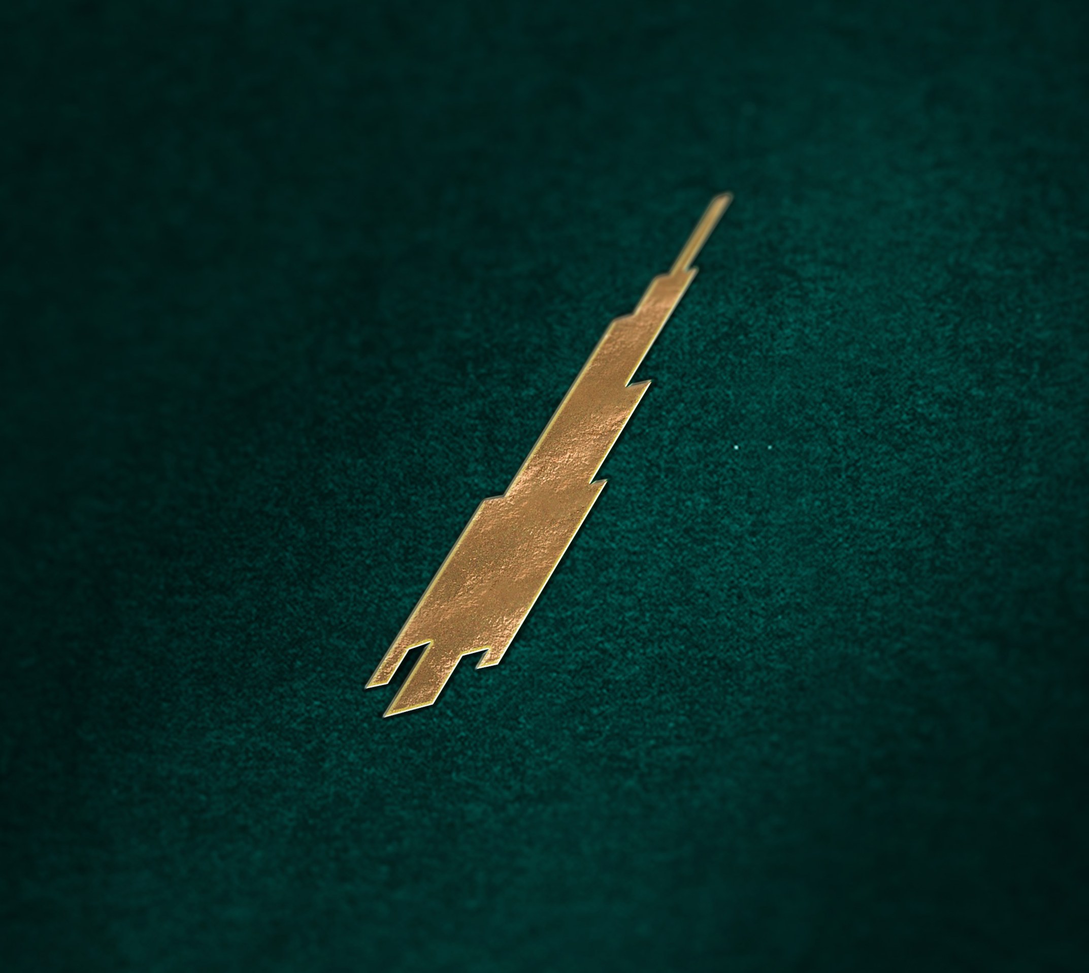 A close-up of the gold At.mosphere mark