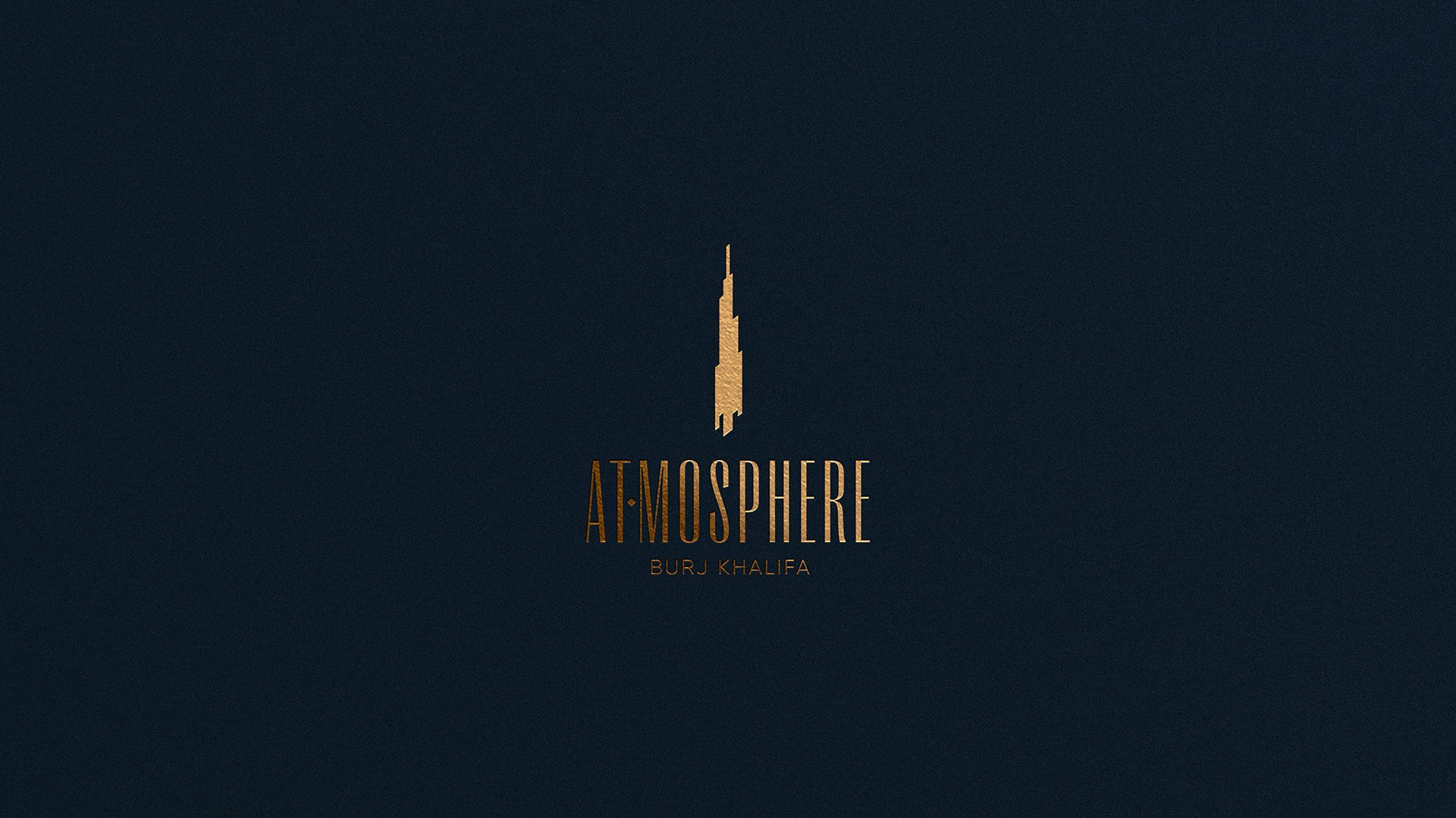 The At.mosphere gold logotype