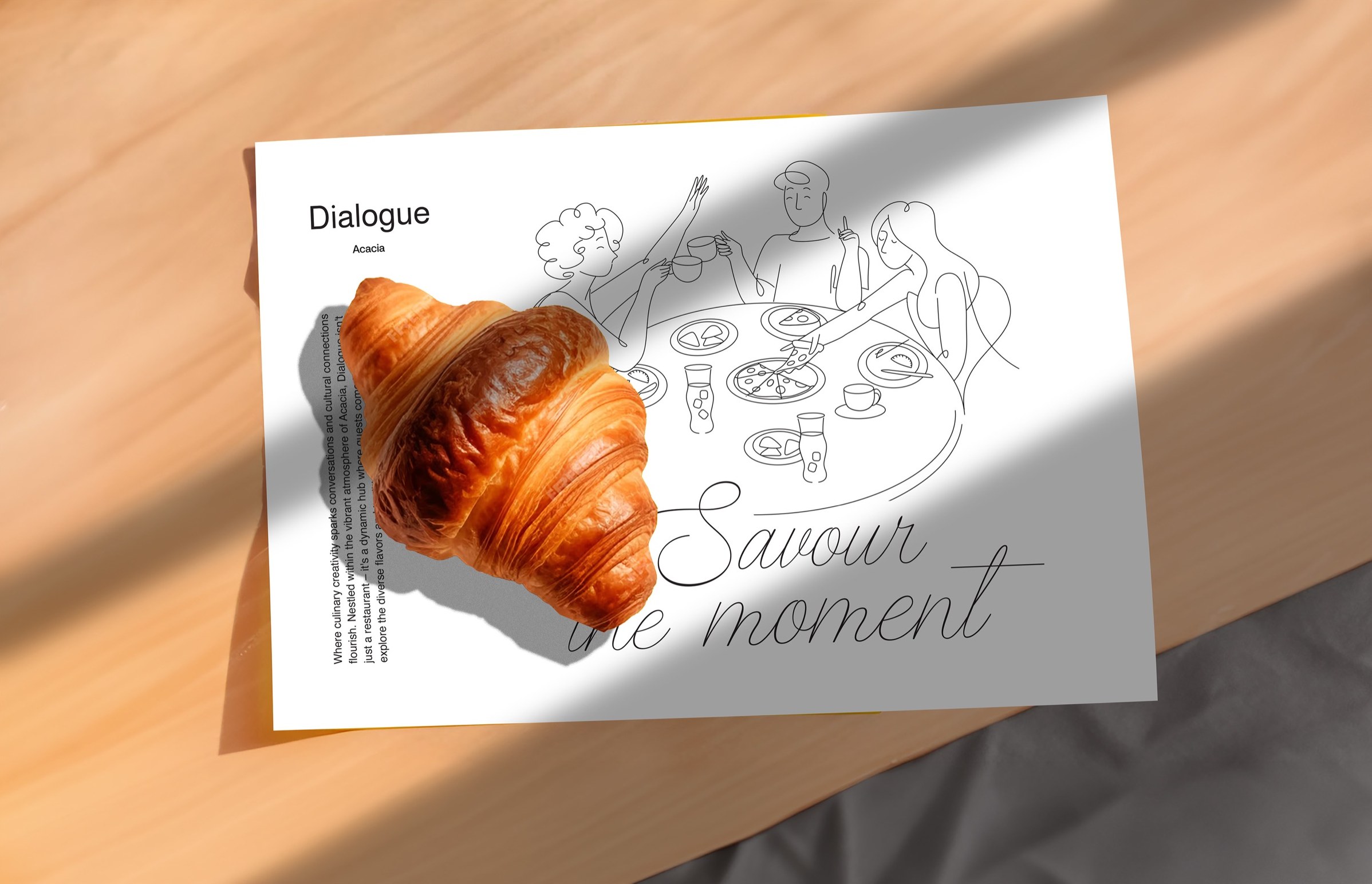 A “Savour the moment” Dialogue poster with a fresh croissant